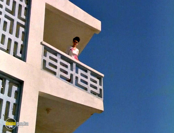 A still #17 from Cat Chaser (1989)