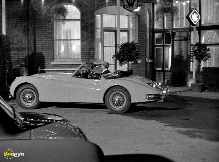 A still #15 from The Green Man (1956)