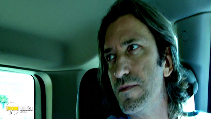 A still #6 from Blood in the Mobile (2010)