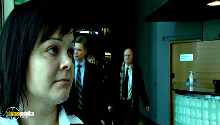 A still #2 from Blood in the Mobile (2010)