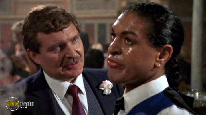A still from Eat the Rich (1987) 