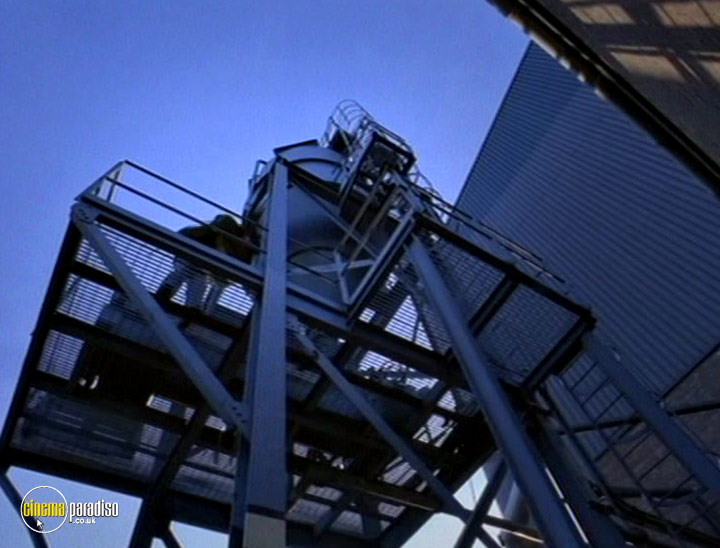 A still #21 from Parasite (2004)