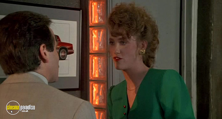 A still #32 from Cadillac Man (1990)