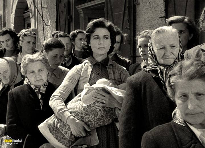 A still #11 from The Divided Heart (1954)