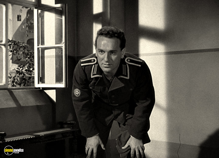A still #8 from The Divided Heart (1954)