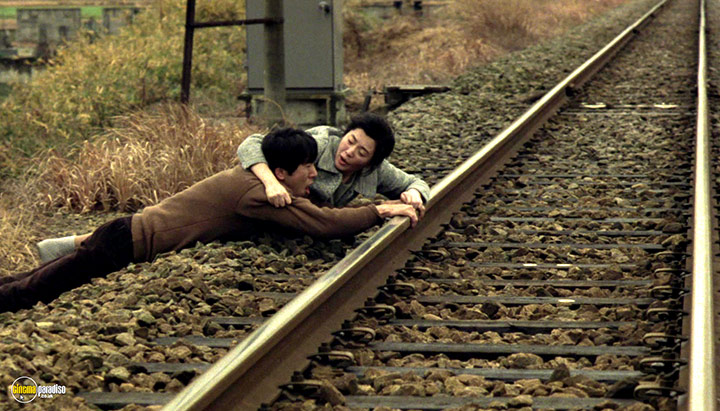 A still #9 from The Sting of Death (1990)