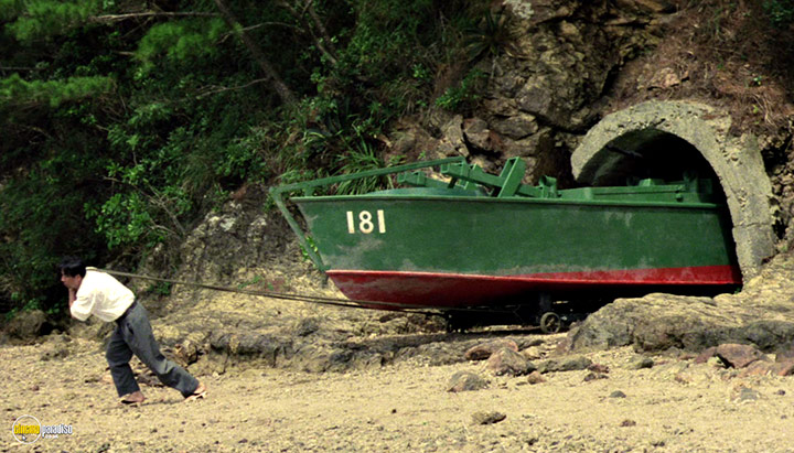 A still #24 from The Sting of Death (1990)