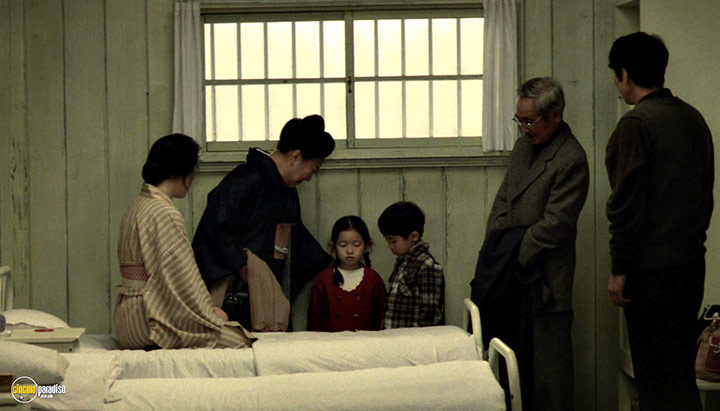 A still #28 from The Sting of Death (1990)