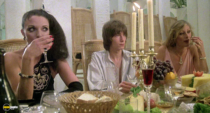 A still #32 from The Stud (1978)