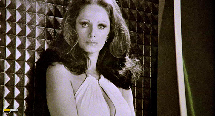A still #56 from The Stud (1978)