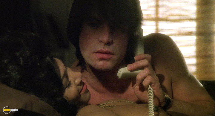 A still #63 from The Stud (1978)