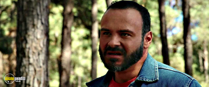 A still #26 from Behind the Trees (2023)