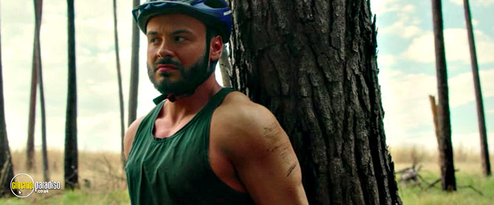 A still #27 from Behind the Trees (2023)