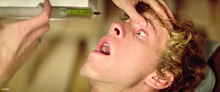A still #62 from Strange Behaviour (1981)