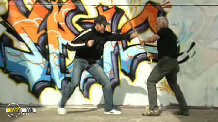 A still #4 from Street Defense: Stick, Street Cane, Makeshift Means (2012)