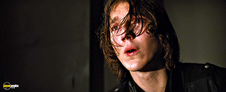 A still #16 from Looper (2012) With Paul Dano