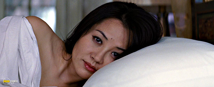 A still #11 from Looper (2012) With Qing Xu
