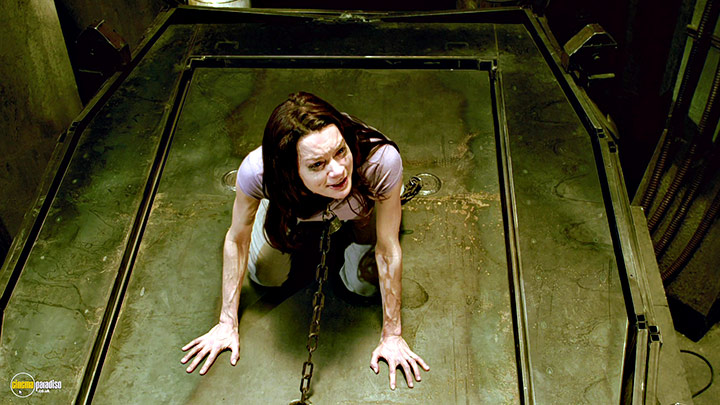 A still #5 from Saw 7 (2010) With Gina Holden