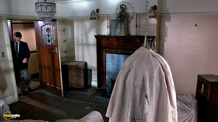 A still #93 from Hellraiser (1987) With Andrew Robinson