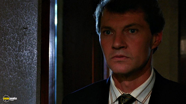 A still #86 from Hellraiser (1987) With Andrew Robinson