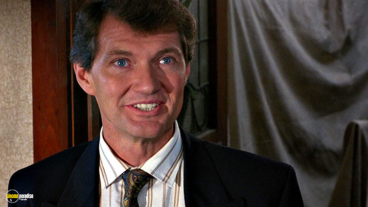 A still #101 from Hellraiser (1987) With Andrew Robinson