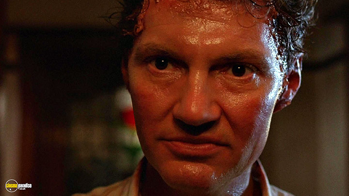 A still #113 from Hellraiser (1987) With Andrew Robinson