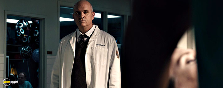 A still #24 from Concussion (2015) With Mike O'Malley