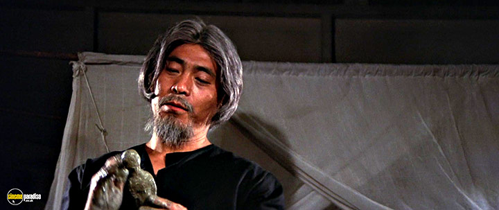 A still #34 from Black Magic (1975) With Feng Ku